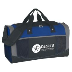 black duffel bag with blue and gray trimmings with an adjustable strap, handles, front zippered compartment, and an imprint saying Daniel's Gymnastics Studio